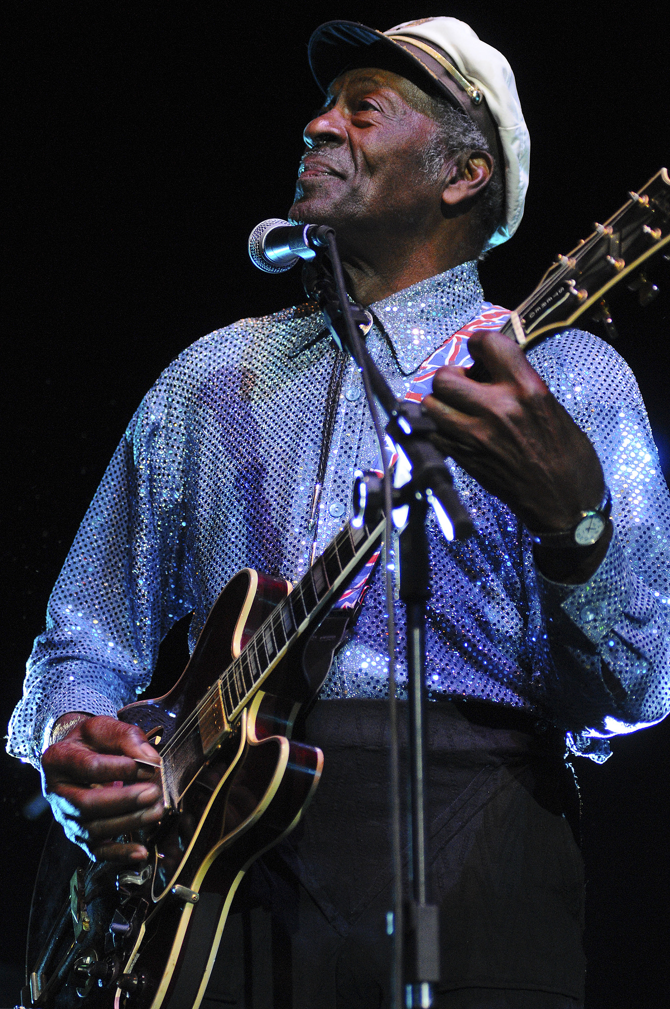 Imagem de referência relacionada a Chuck Berry, item descrito como cantor, compositor e guitarrista norte-americano