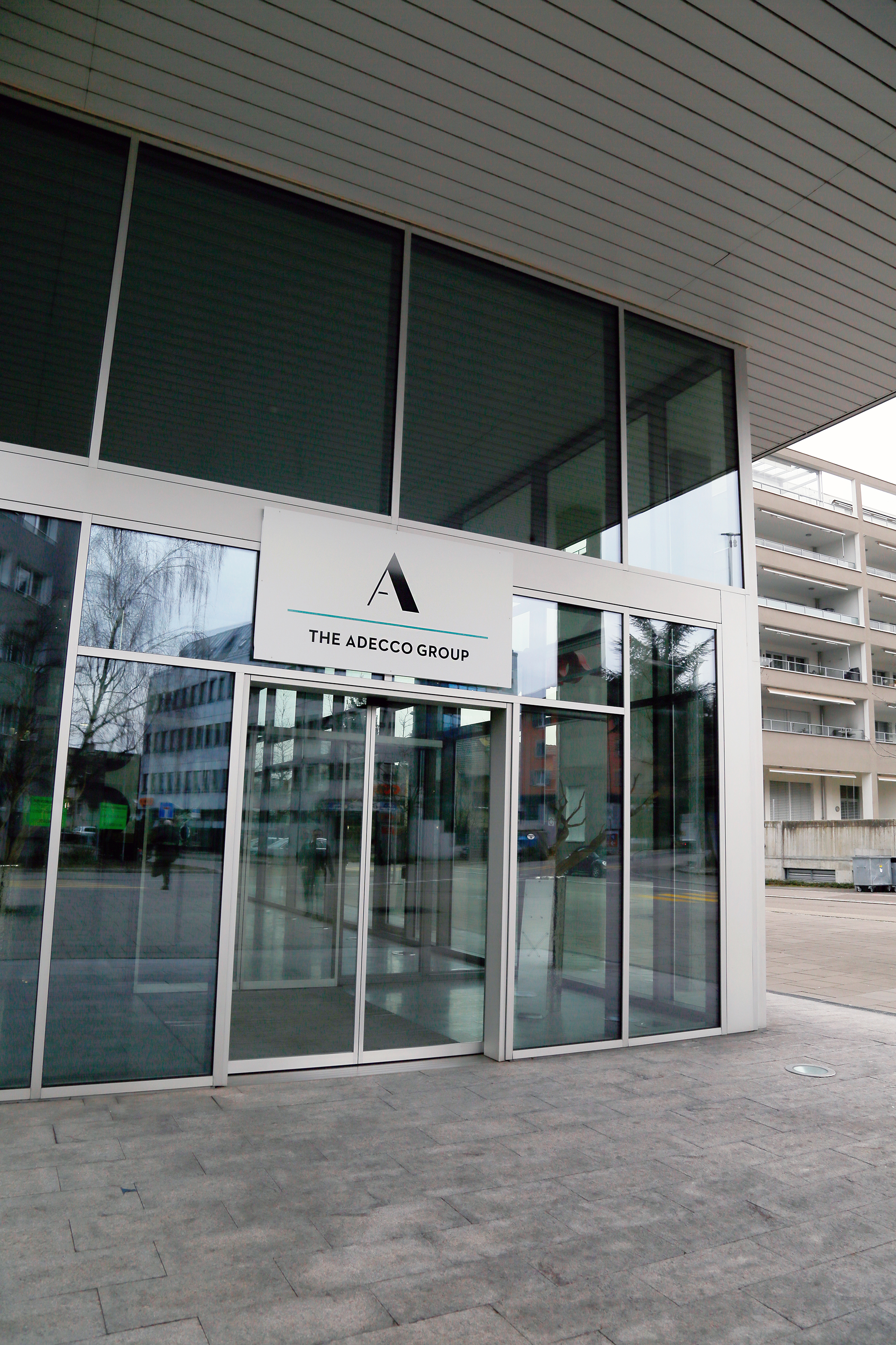 Imagem de referência relacionada a Adecco, item descrito como registro de referência sobre Adecco, organizado a partir de dados estruturados abertos