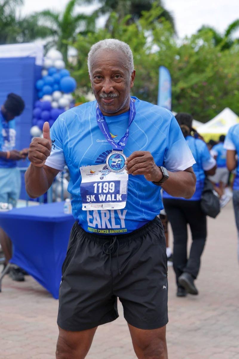 Running enthusiast and prostate cancer survivor John Leiba gives the lens a thumbs-up after completing the 5K route at the 2026 Blue Run/Walk event on September 20.